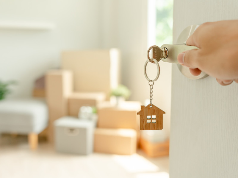 Happy family receiving house keys